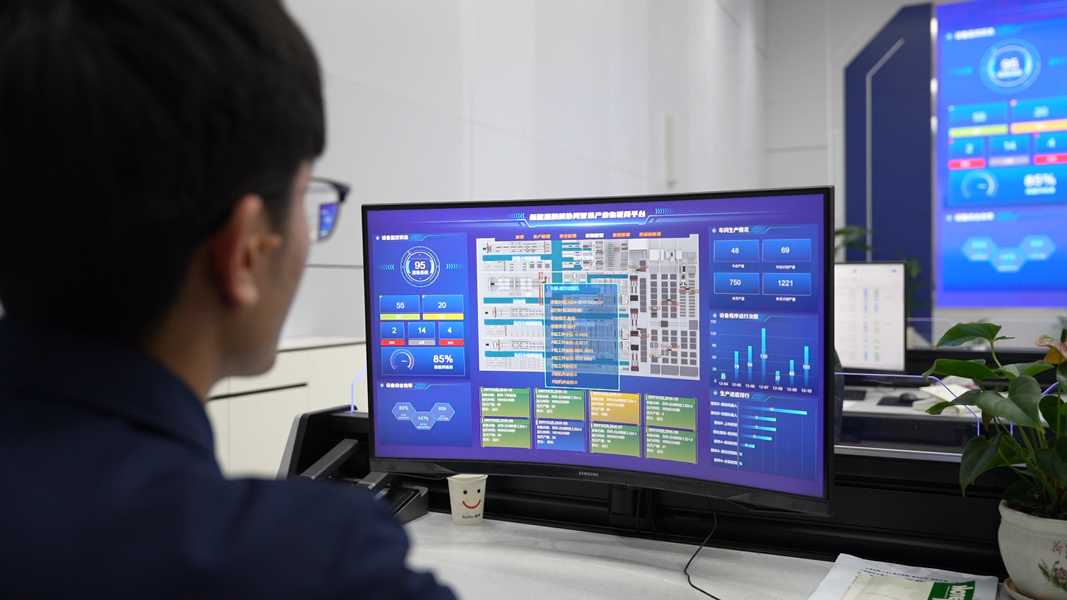 Person analyzing data on screens