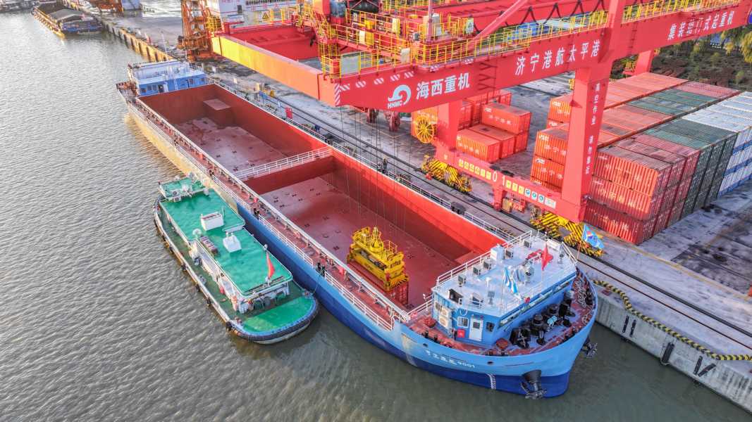 Cargo ships at busy port terminal